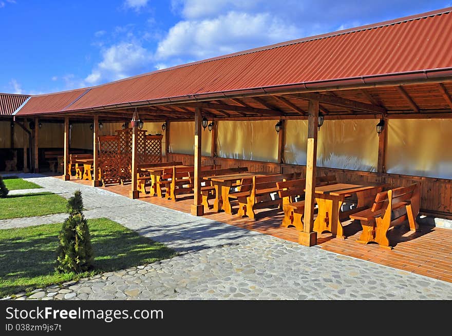 Wooden restaurant terrace in a sunny day