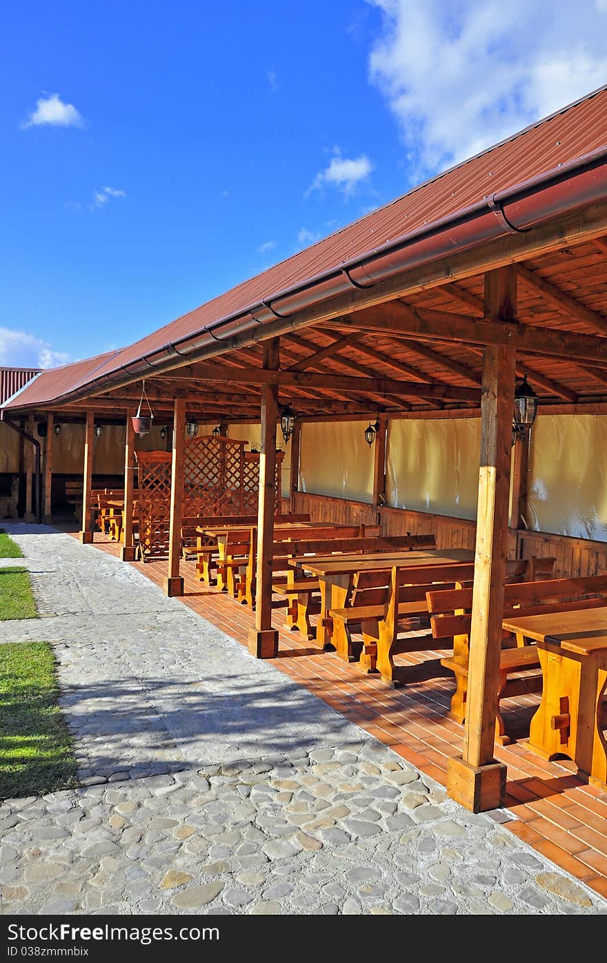 Wooden restaurant terrace in a sunny day. Wooden restaurant terrace in a sunny day