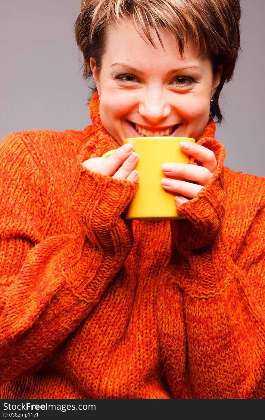 Woman  with a mug in hands