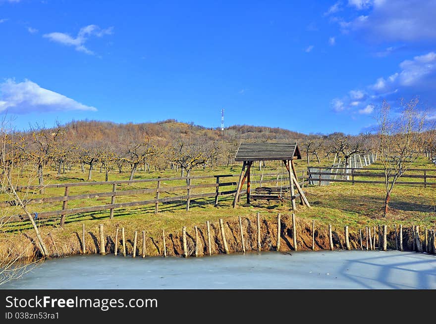 Garden swing and iced lake