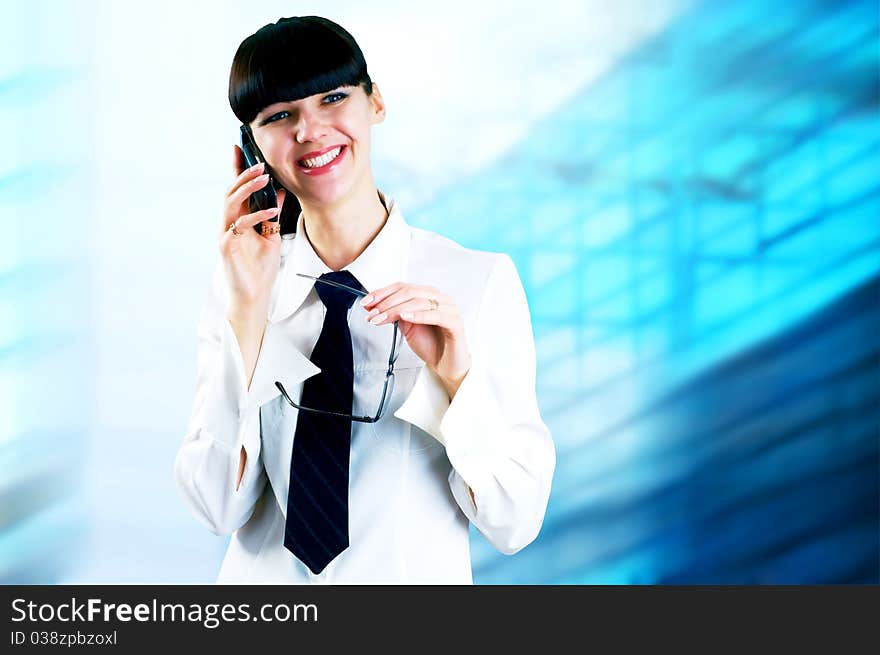 Hapiness Businesswoman standing on the business background. Hapiness Businesswoman standing on the business background