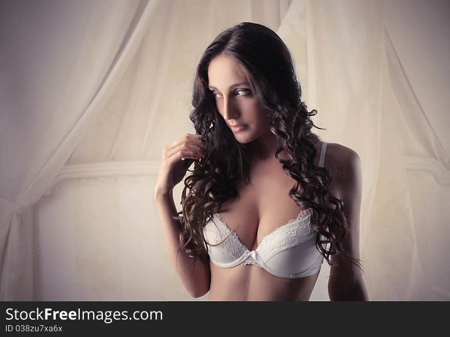 Portrait of a beautiful woman wearing a bra. Portrait of a beautiful woman wearing a bra