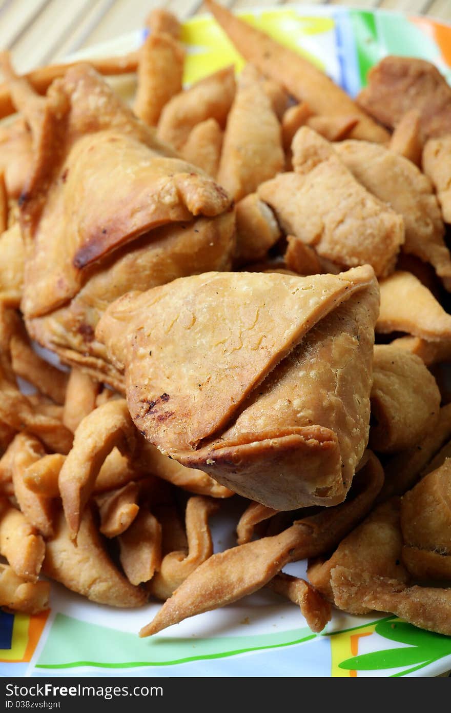 Closeup shot of fried samosas and matri. Closeup shot of fried samosas and matri.