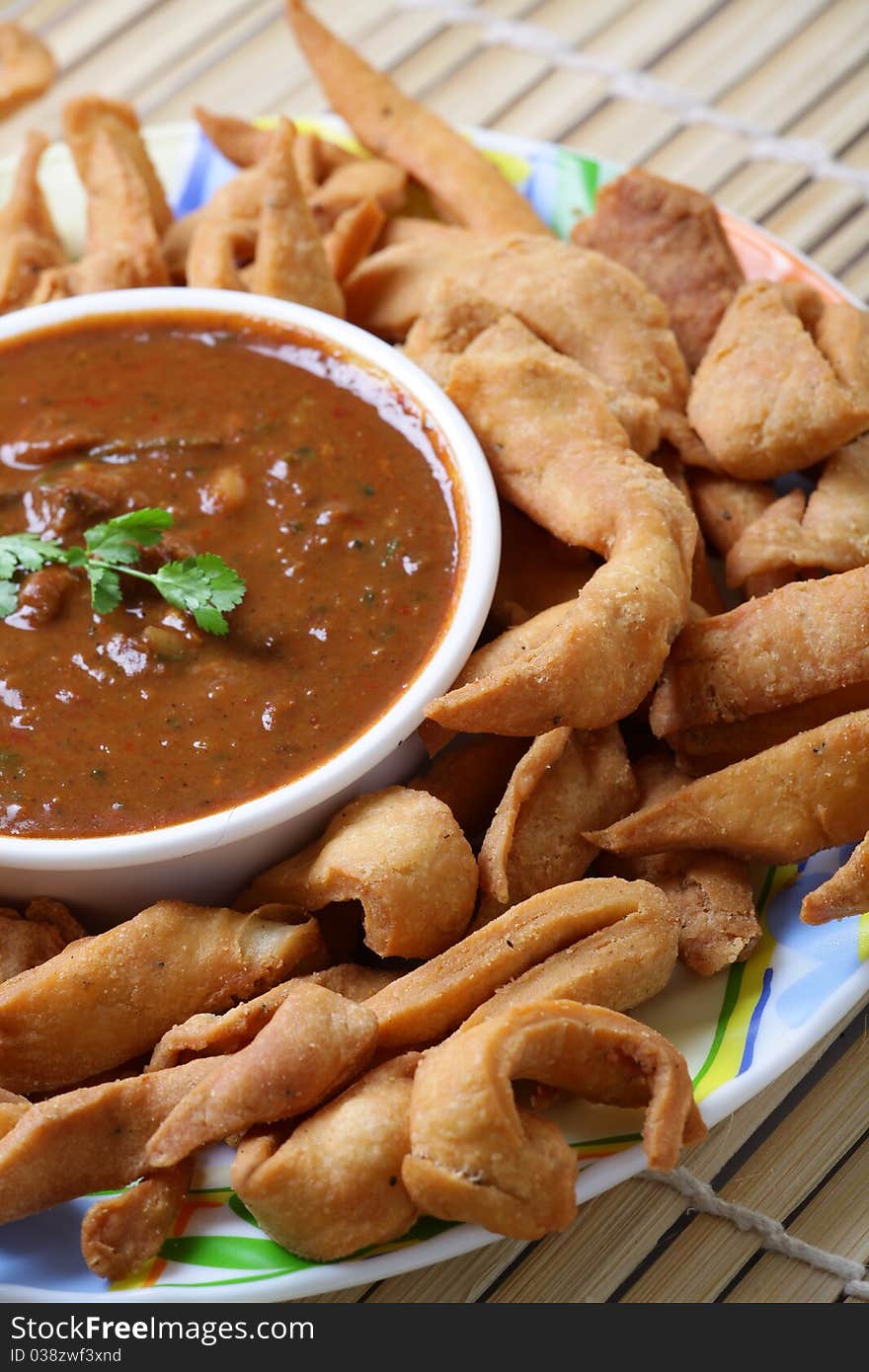 Indian spicy chutney with matri snack looking yummy. Indian spicy chutney with matri snack looking yummy.