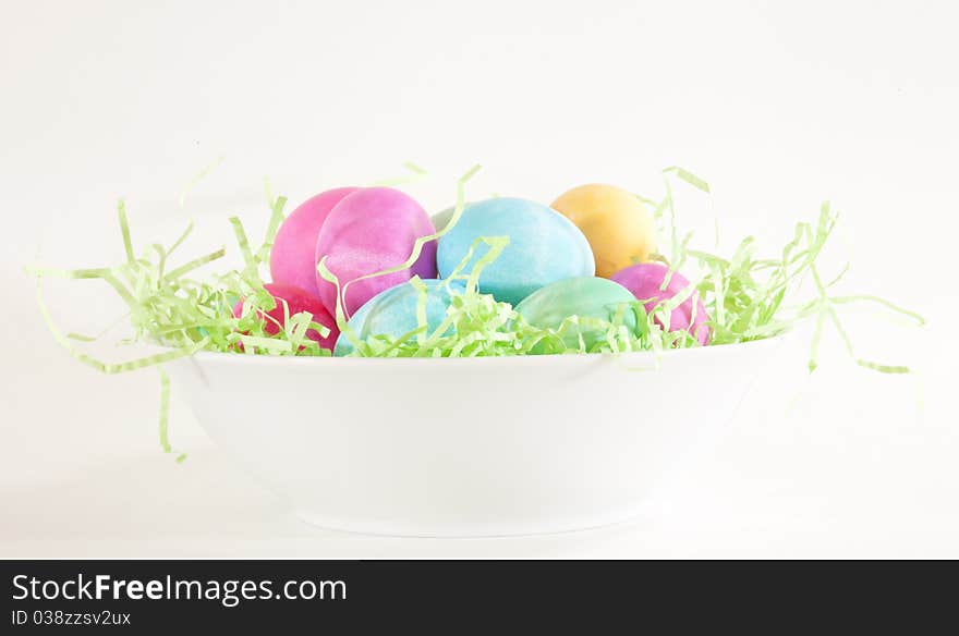 Easter eggs presented in a white bowl. Easter eggs presented in a white bowl