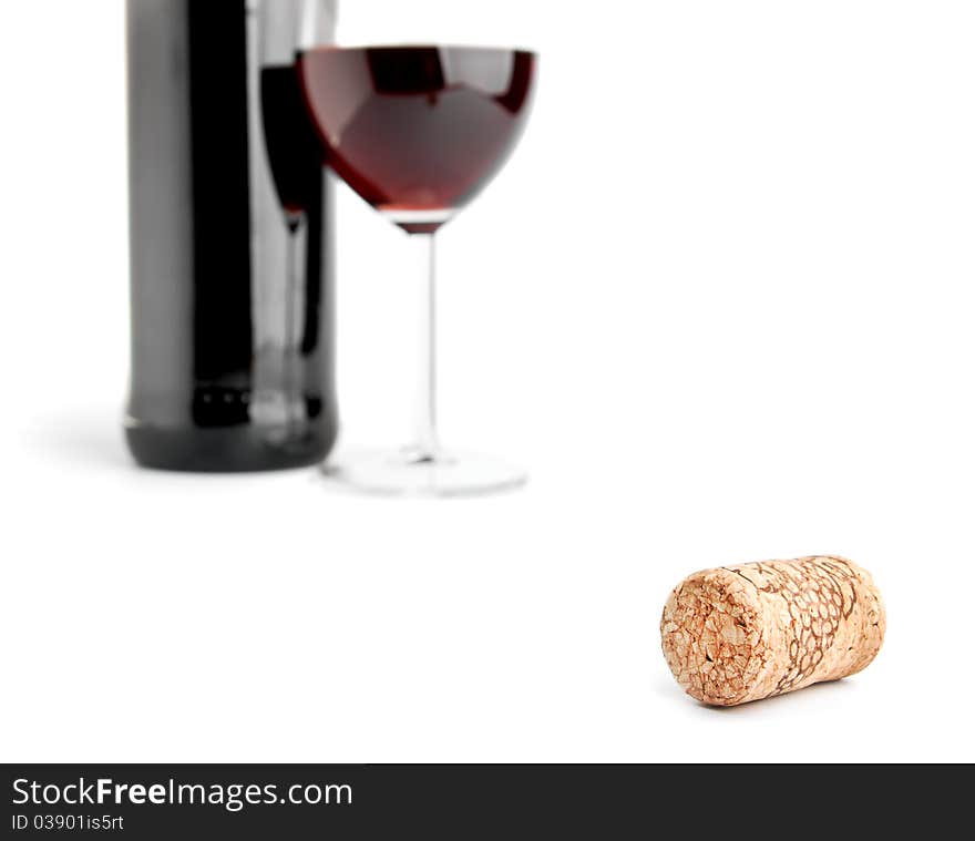 Wine cork and glass on white. Wine cork and glass on white