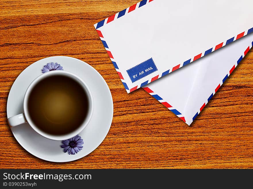 Air mail envelope and coffee cup