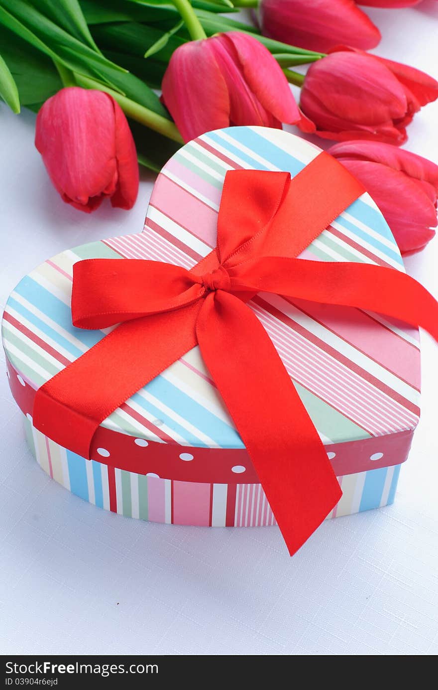 Gift box shape of heart and tulip flowers. Gift box shape of heart and tulip flowers