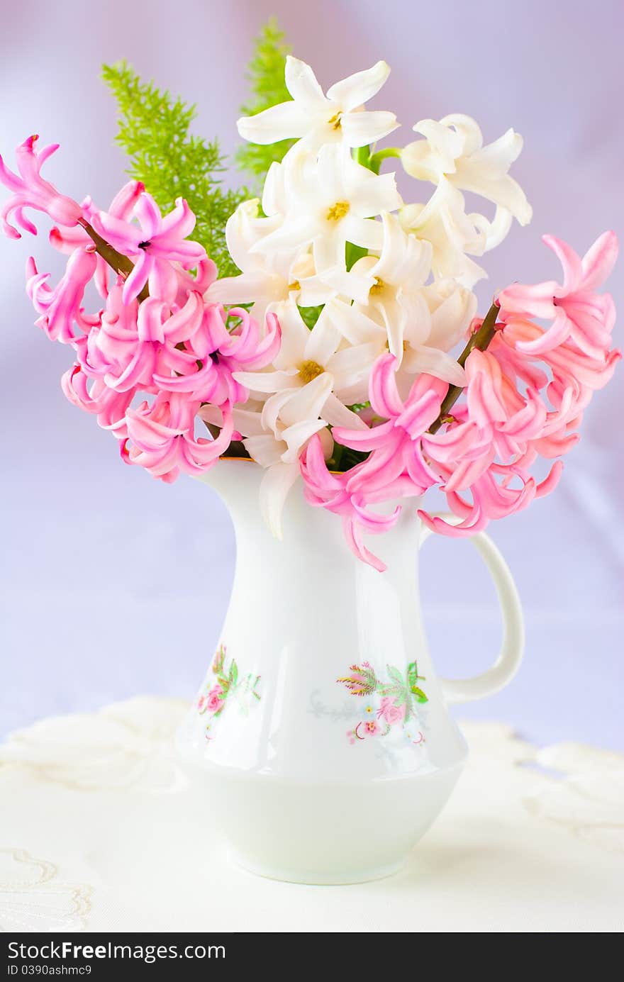 Beautiful spring pink and white hyacinth in a vase. Beautiful spring pink and white hyacinth in a vase