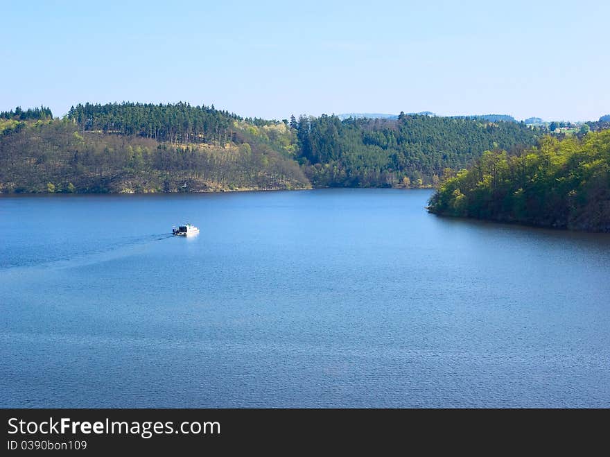 View from the top point on the river Vltava in the spring morning. Castle Orlik nad Vltavou (the German name: Burg Worlik). Czechia. View from the top point on the river Vltava in the spring morning. Castle Orlik nad Vltavou (the German name: Burg Worlik). Czechia.