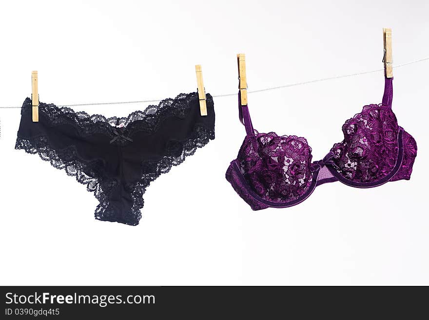 Selection of Lace Underwear Hanging on Line