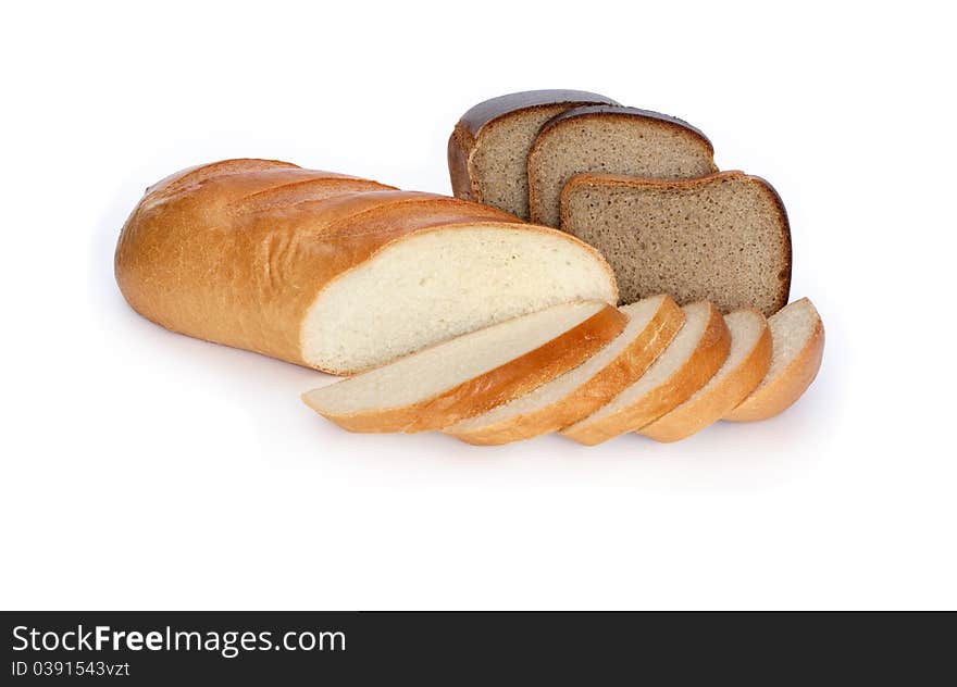 Sliced fresh-baked long loaf and rye bread isolated on white background with clipping path. Sliced fresh-baked long loaf and rye bread isolated on white background with clipping path