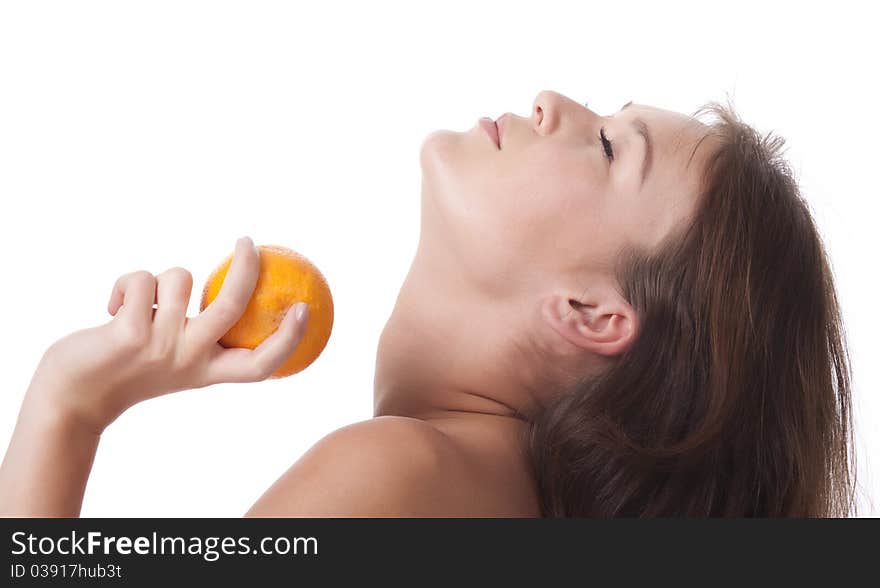 The woman with an orange fruit