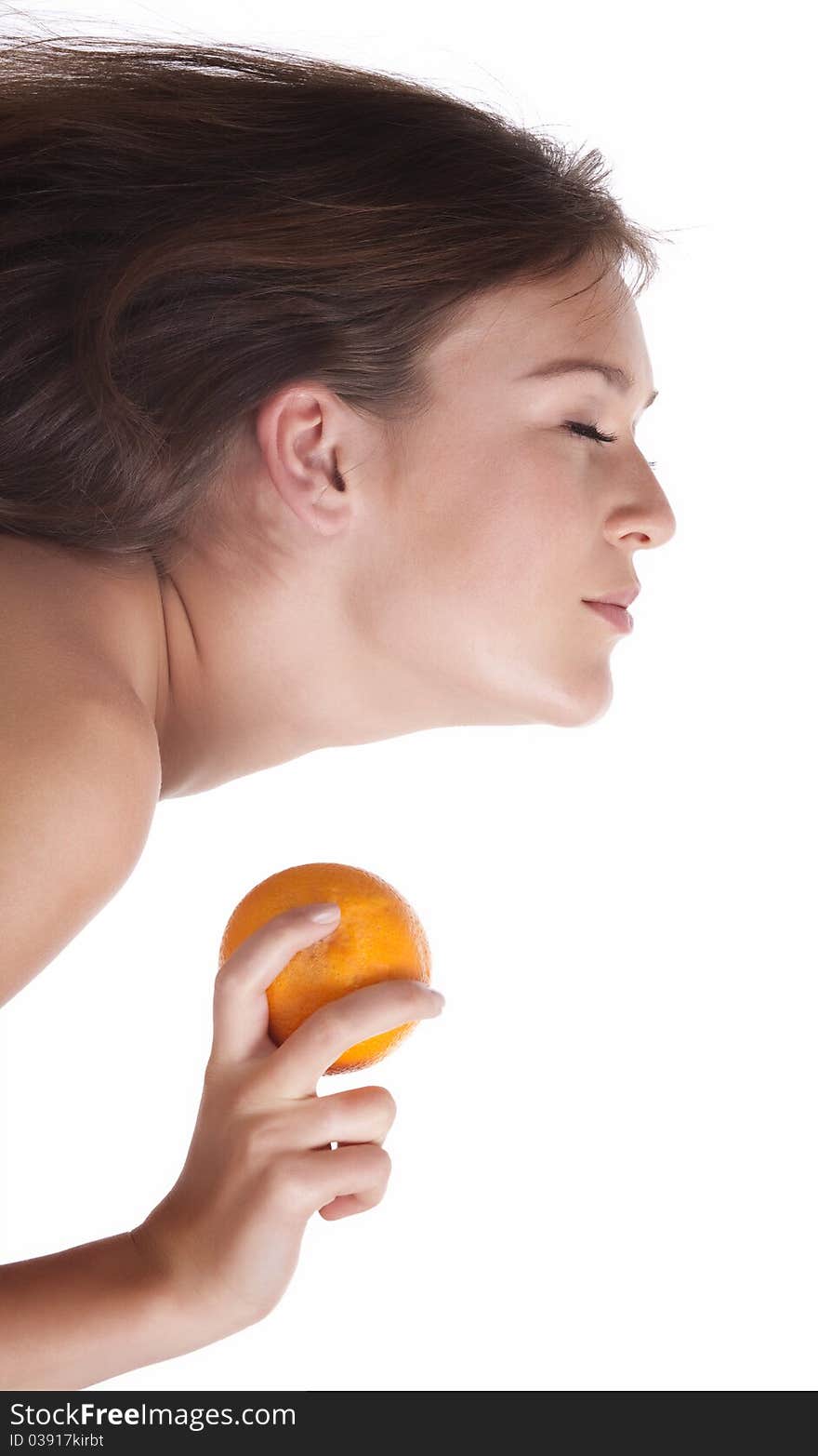 The woman with an orange fruit the isolated image