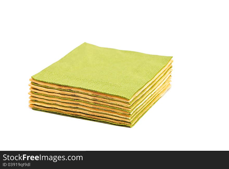 Green and yellow napkins isolated on a white background. Green and yellow napkins isolated on a white background.