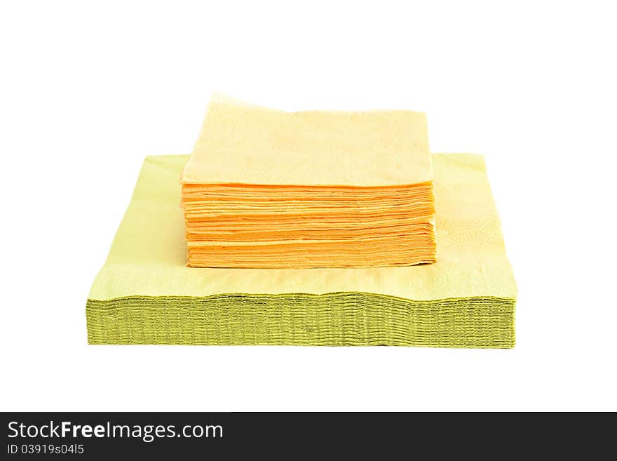 Green and yellow napkins isolated on a white background. Green and yellow napkins isolated on a white background.