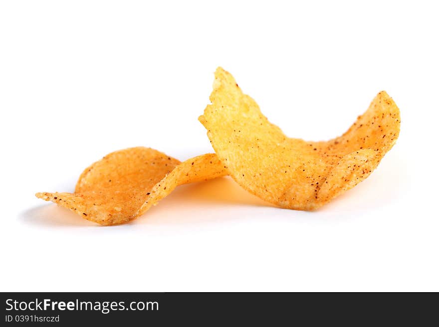 Close up of potato chips isolated on white background.