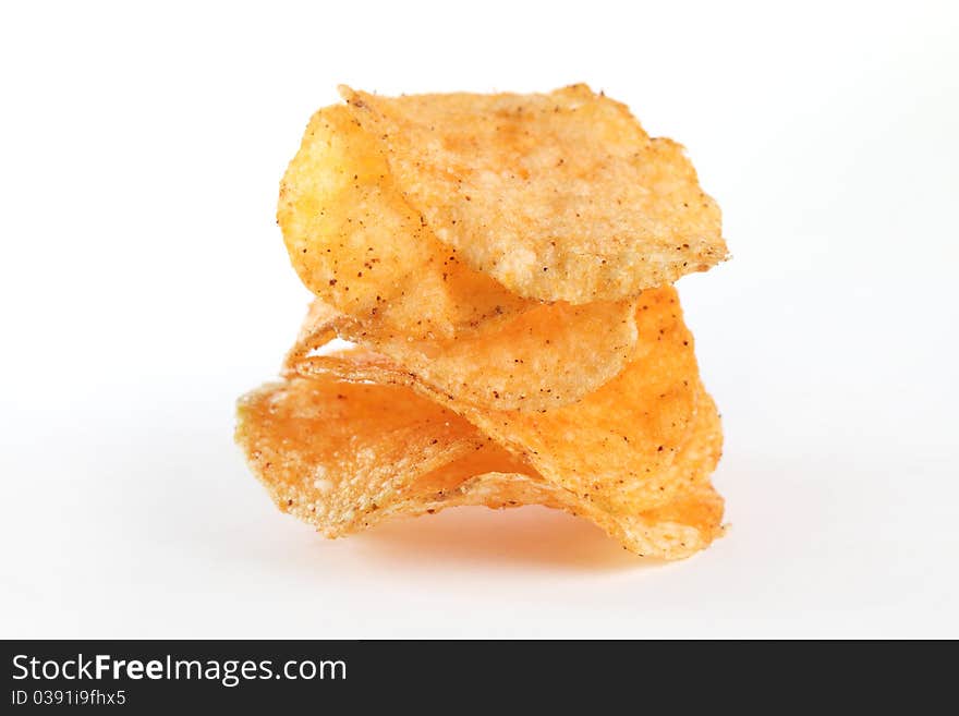 Close up of potato chips isolated on white background.