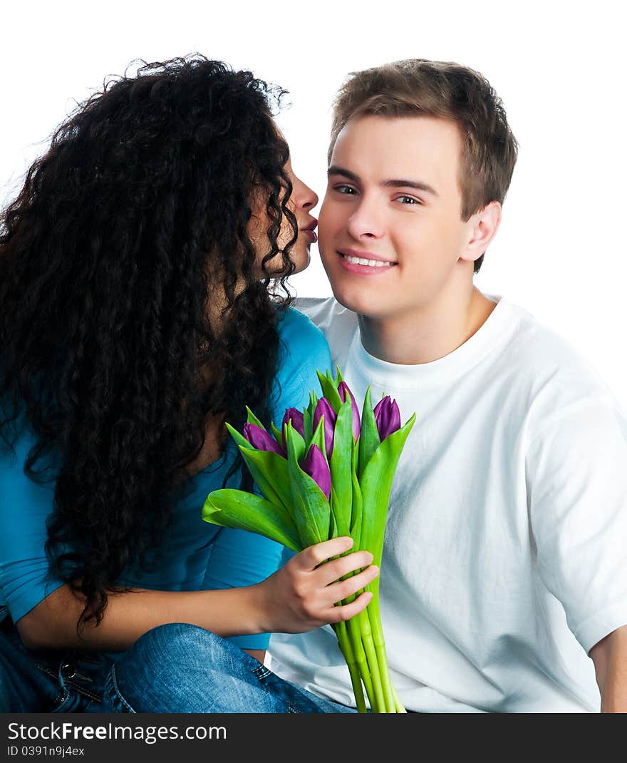 Beautiful young couple with tulips