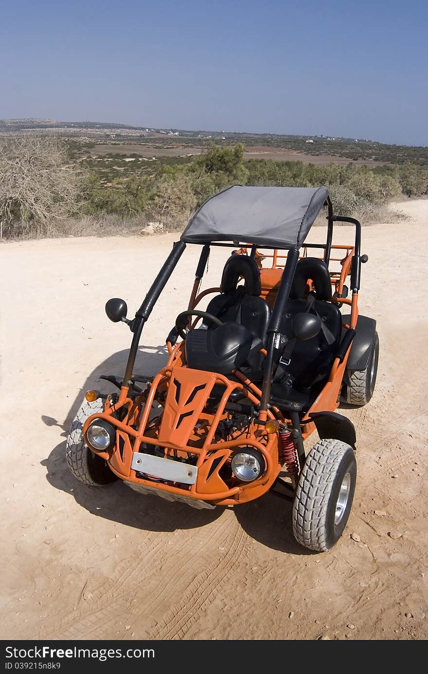 Parked beach Buggie on sand dunes