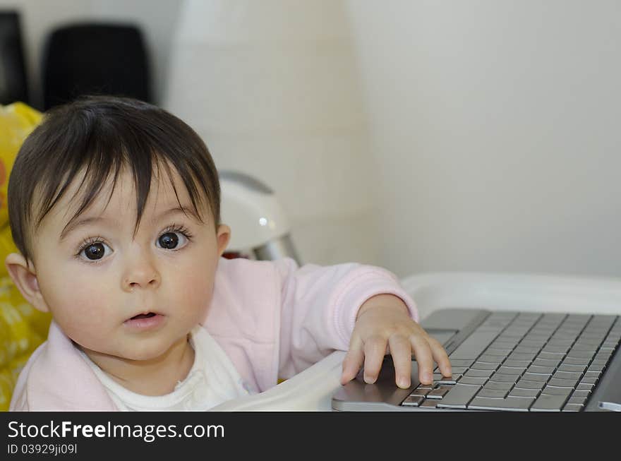 1 Year Baby Girl trying to use her Netbook, Italy