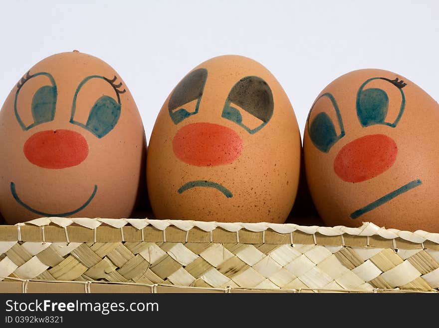 Three eggs with different expressions