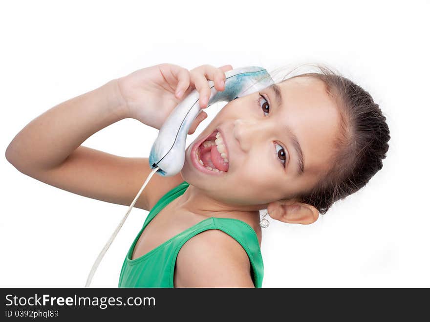 A young girl, isolated on white spoke emotionally on the phone. A young girl, isolated on white spoke emotionally on the phone