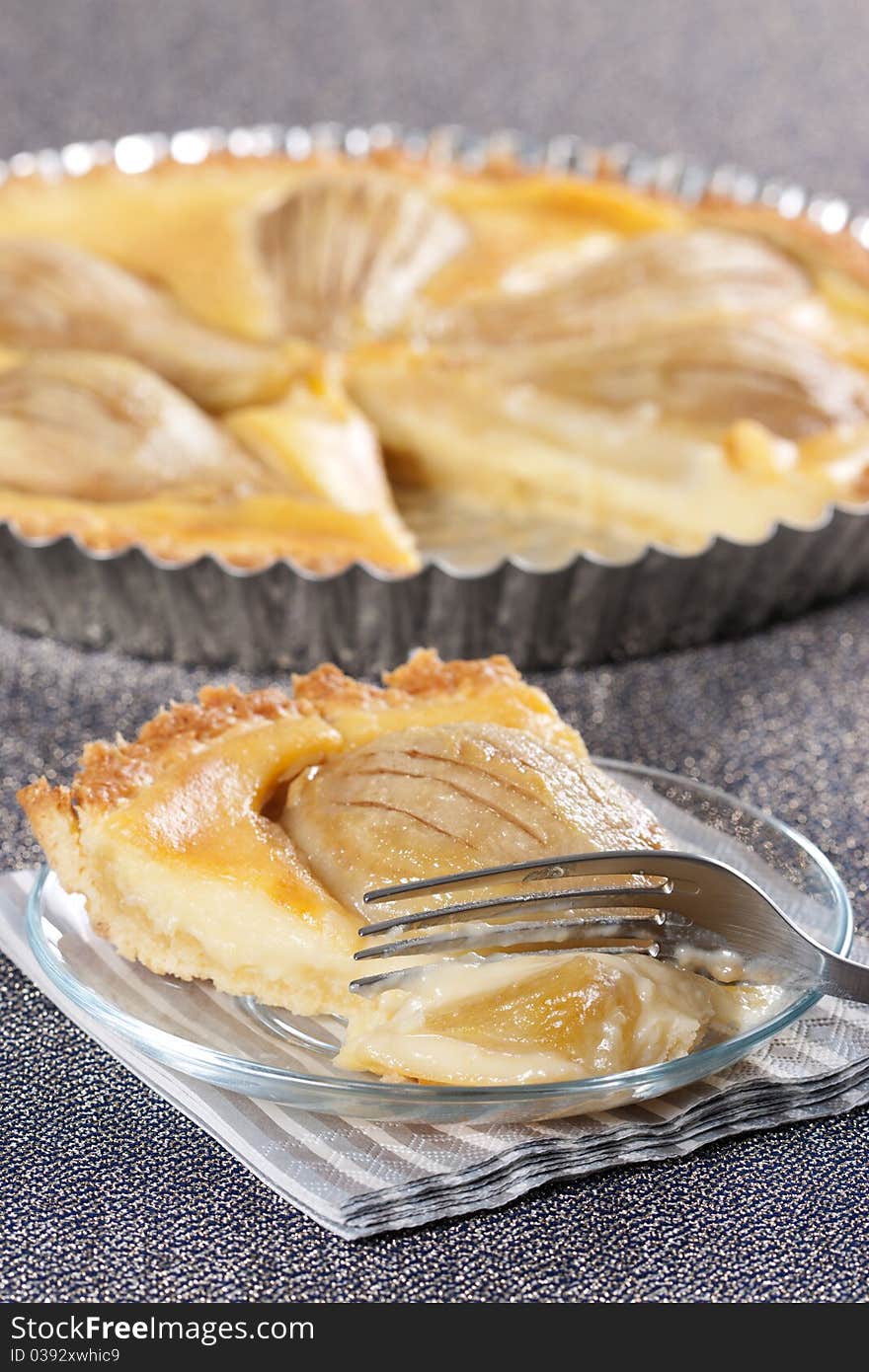 Tart from pears in the baking dish. Tart from pears in the baking dish