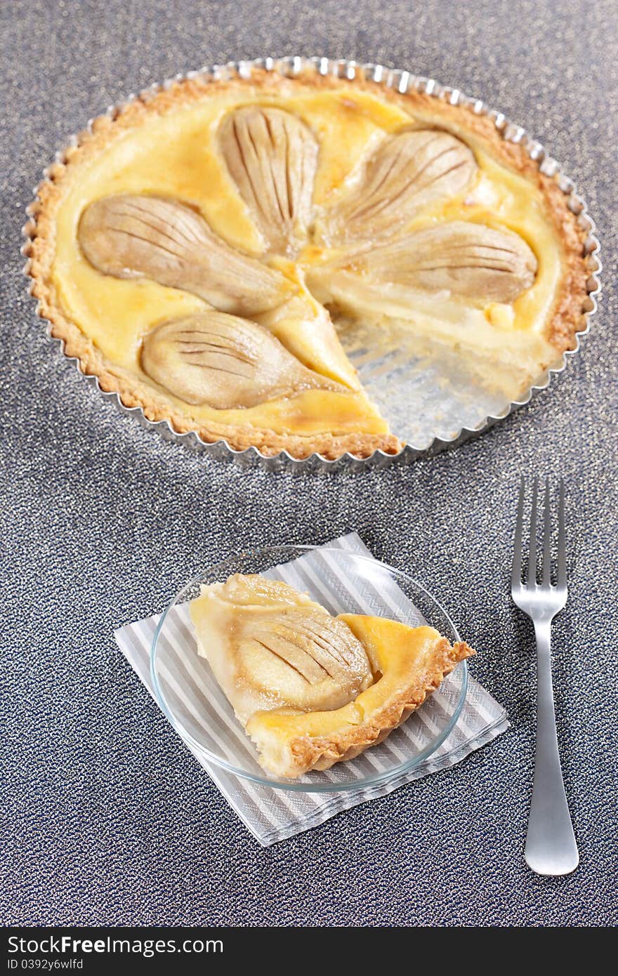 Tart from pears in the baking dish. Tart from pears in the baking dish