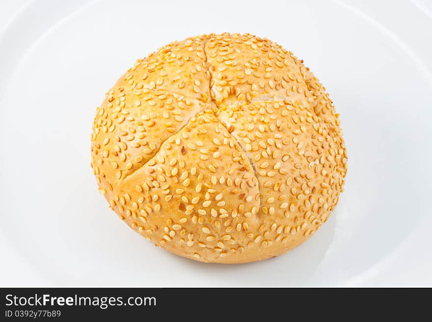 A  sesame bread on white background