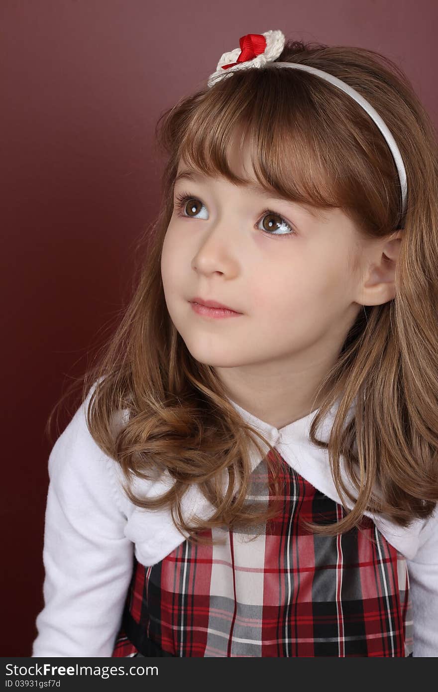 Beautiful little girl wearing a head band. Beautiful little girl wearing a head band