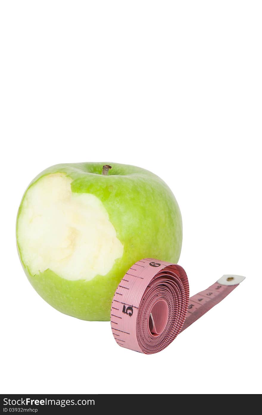 Green apple and tape isolated on white background