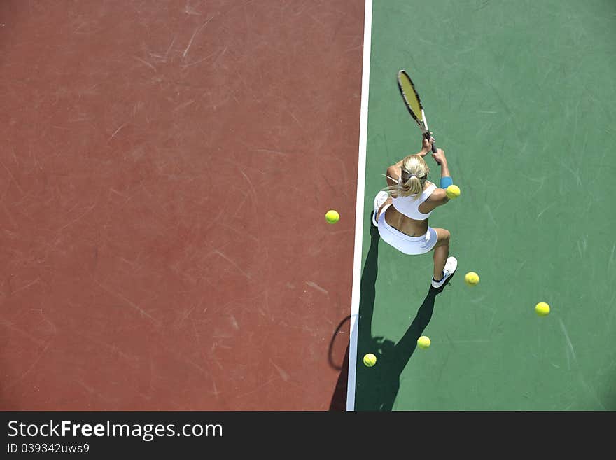 Young Woman Play Tennis Outdoor