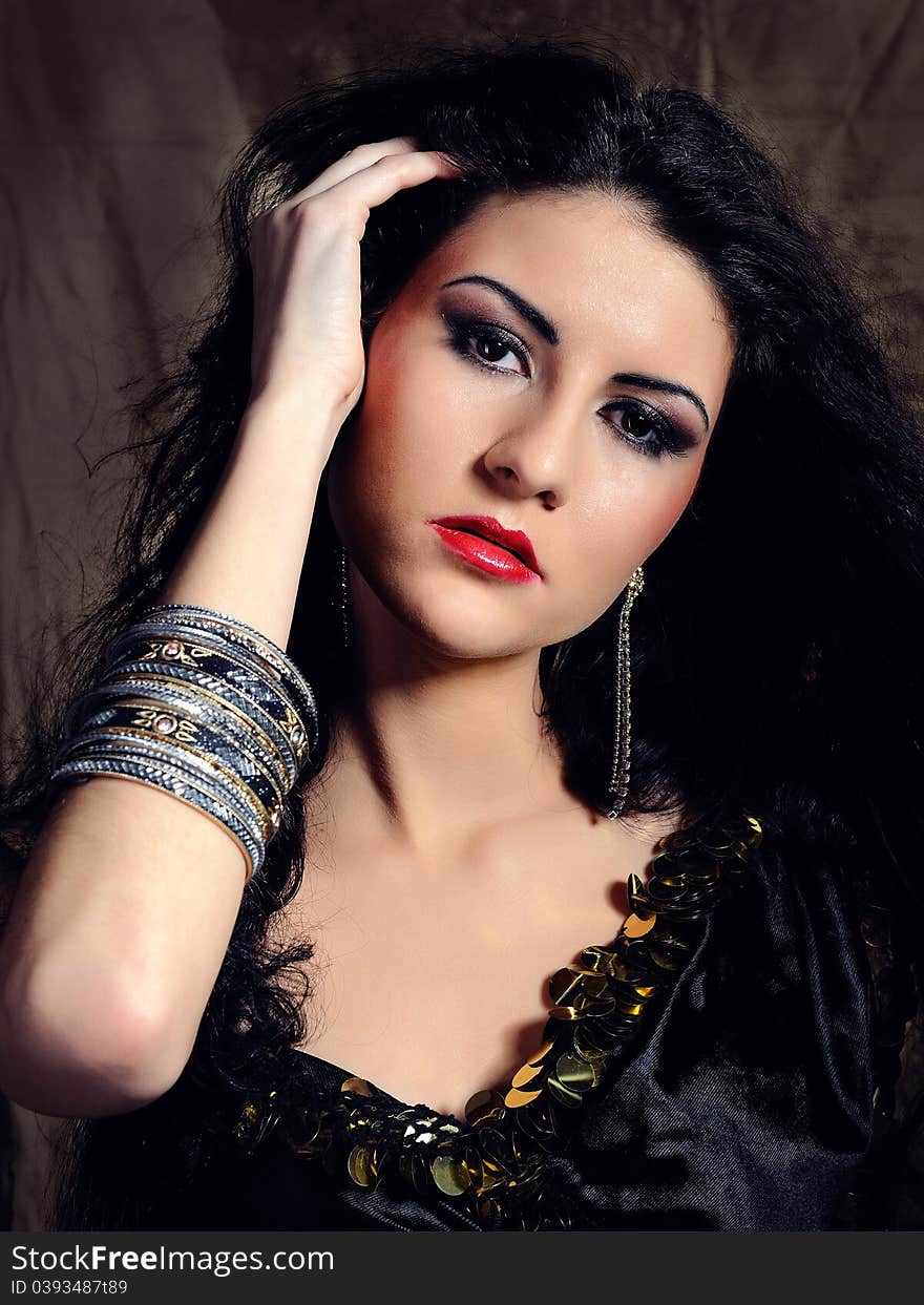 Beautiful model woman with long black healthy hair in arabic traditional clothes. Beautiful model woman with long black healthy hair in arabic traditional clothes