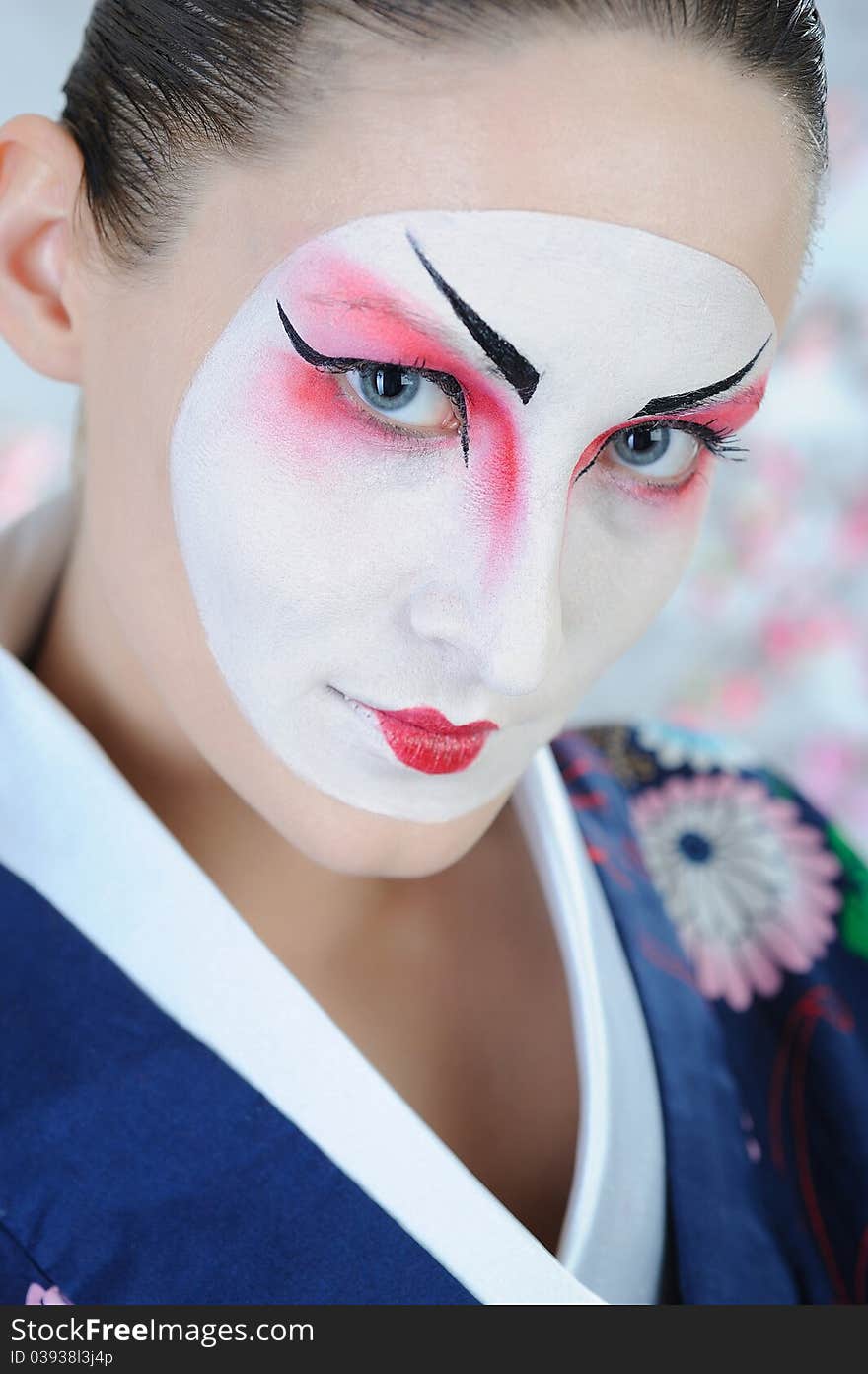 Close-up artistic portrait of japan geisha woman with creative make-up