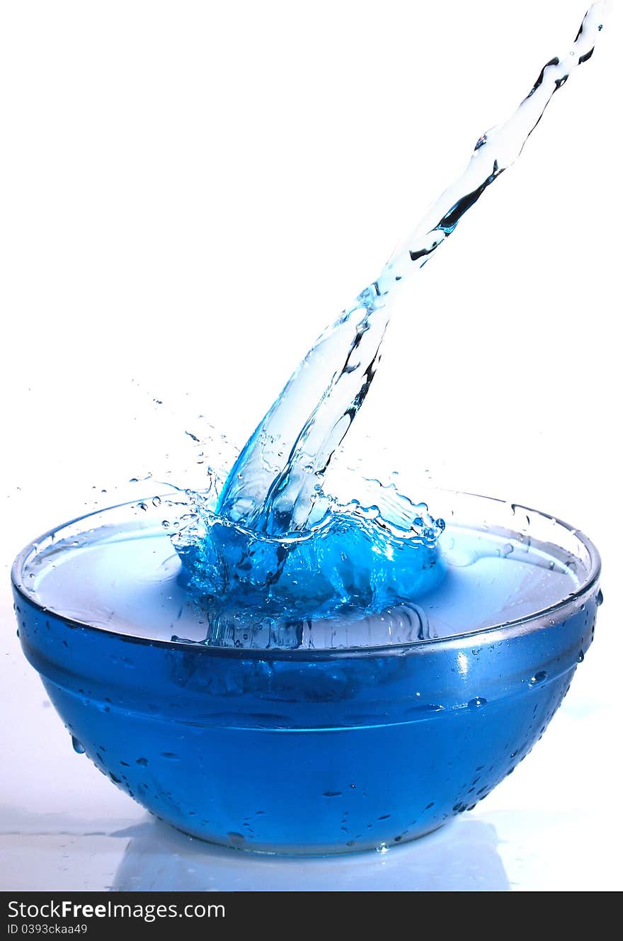 Blue water splash isolated on white background