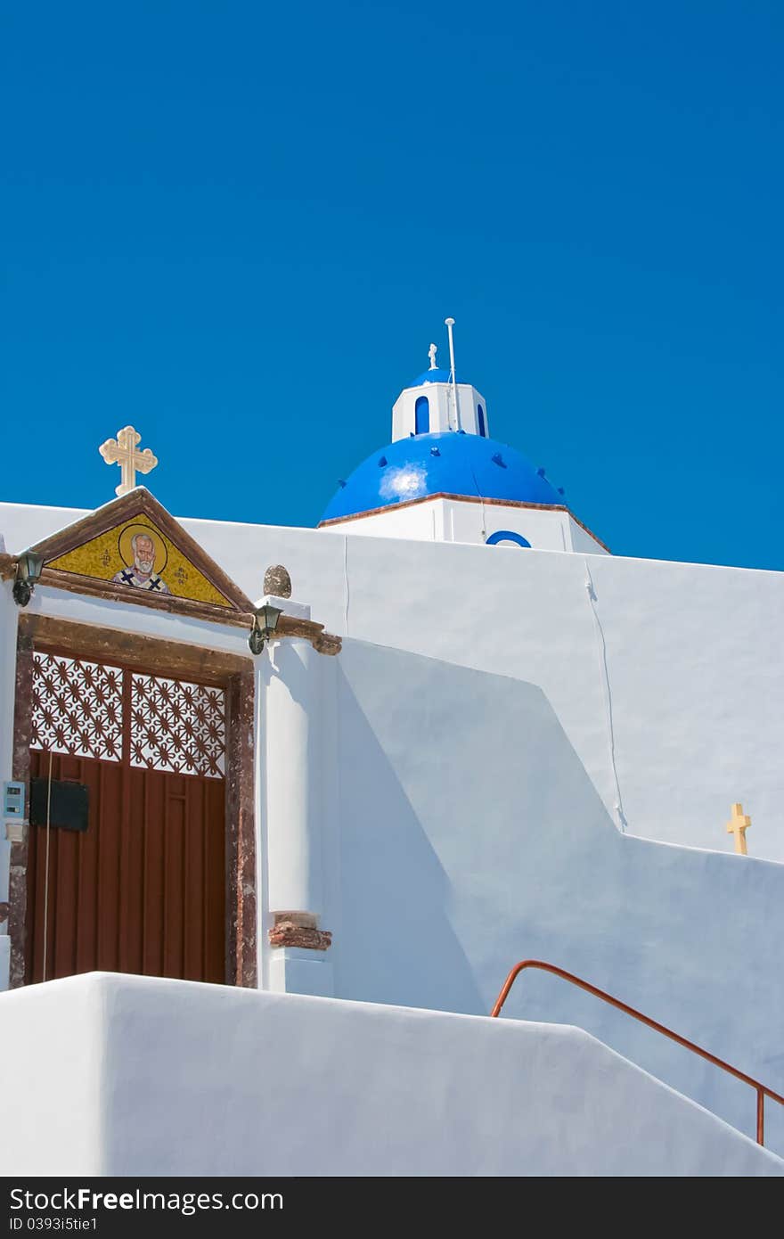 Colorful street with long old staircase and traditional architecture on island of Santorini in Fira, Greece. Colorful street with long old staircase and traditional architecture on island of Santorini in Fira, Greece.