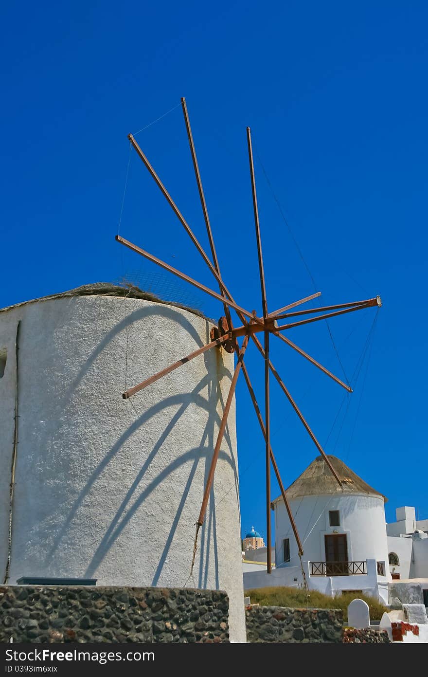 Big windmill in Oia village on island of Santorini, Greece. Big windmill in Oia village on island of Santorini, Greece