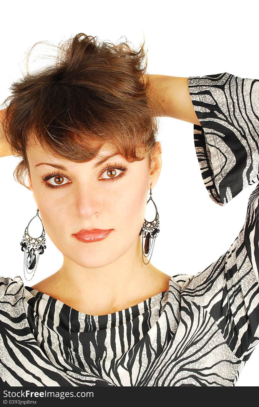 Portrait of attractive young woman with luxory earings isolated on the white. Portrait of attractive young woman with luxory earings isolated on the white.