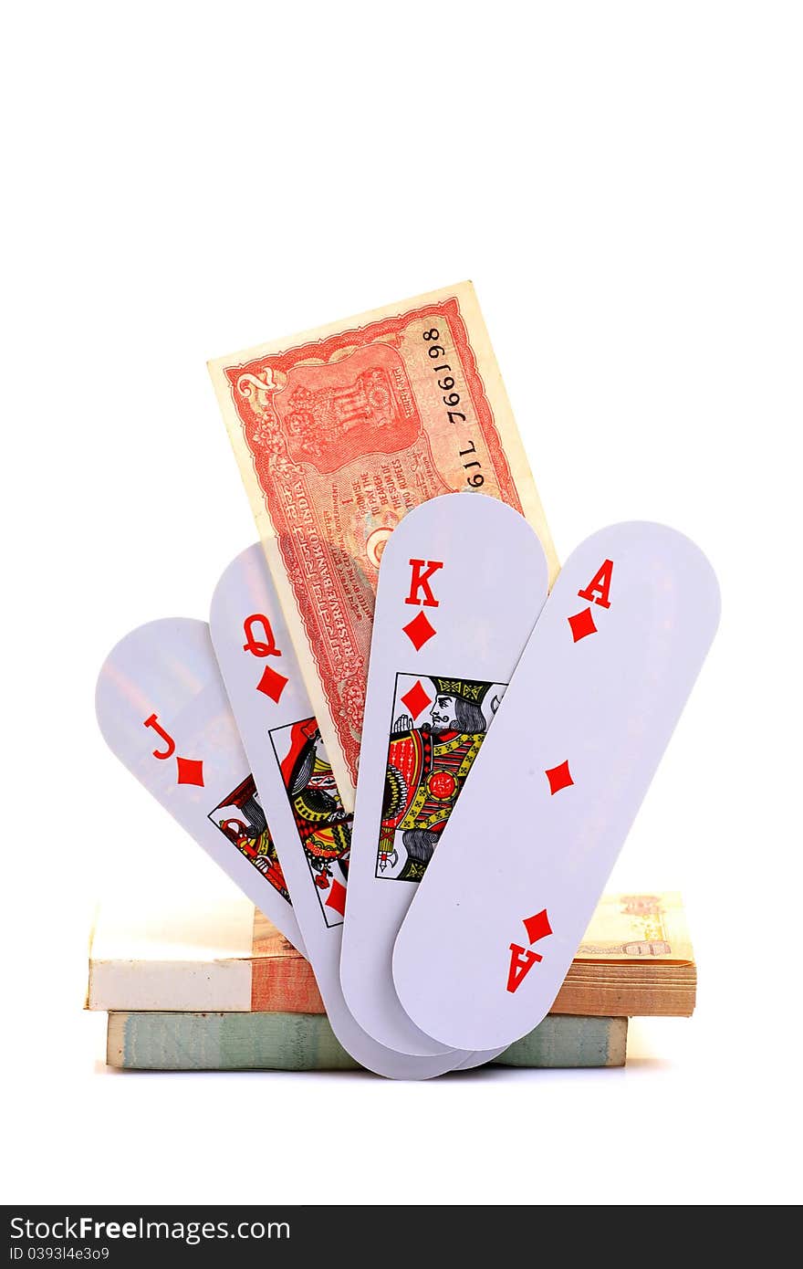 Money and playing cards isolated on white background. Money and playing cards isolated on white background.