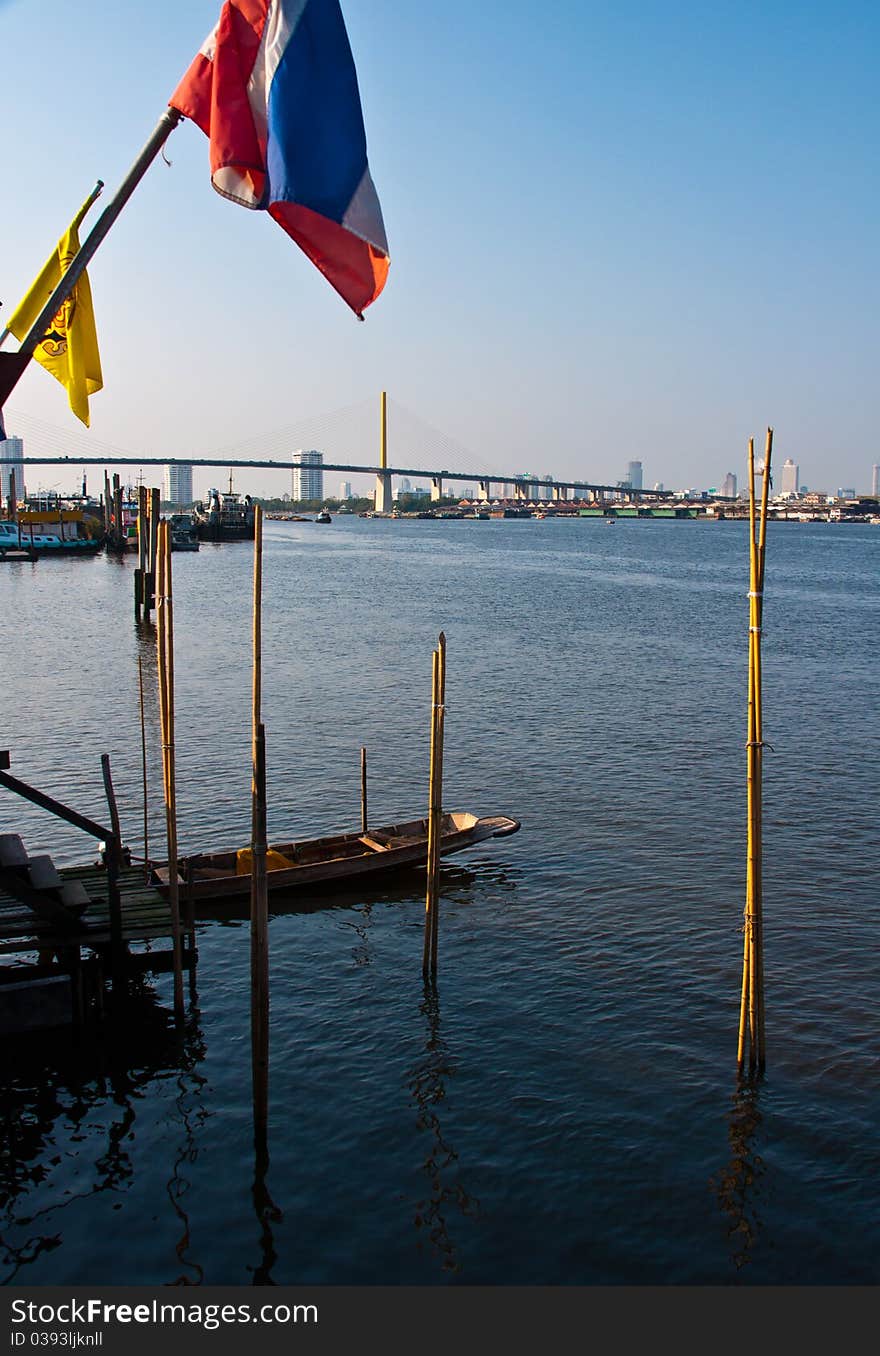 Small pier on the Chao Phraya River at bangkok in thailand