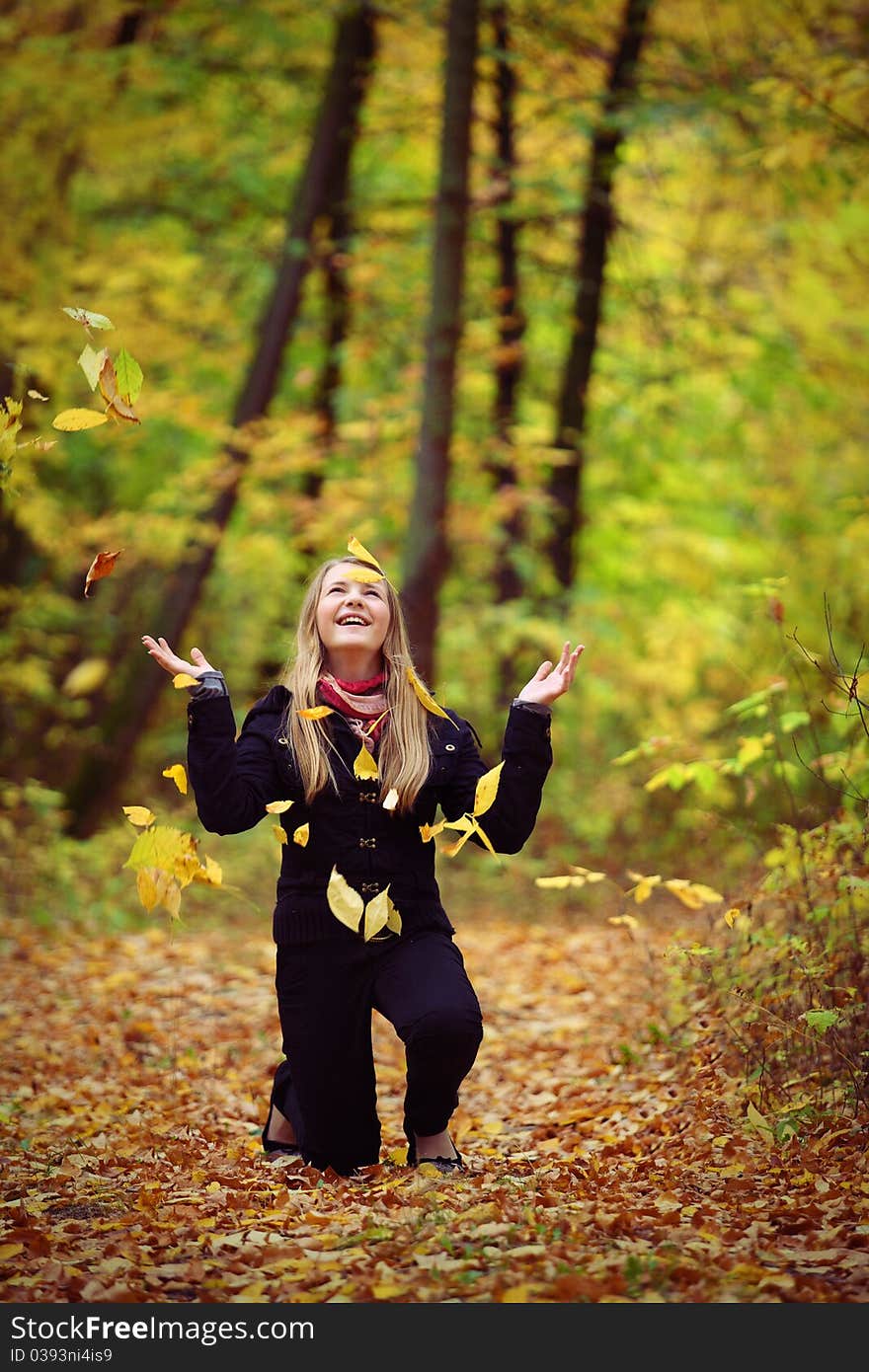 A Girl Is In An Autumn Park