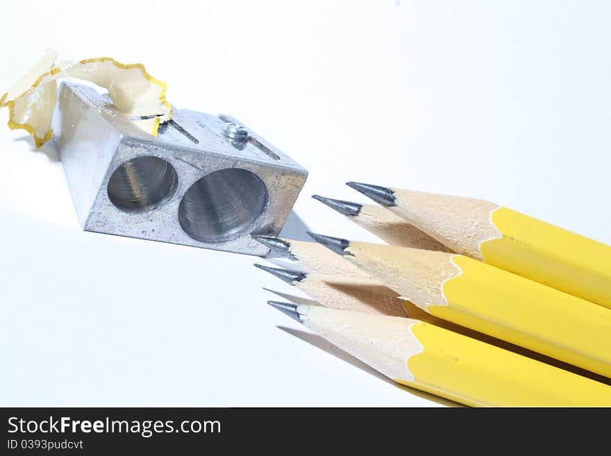 Pen and pencil eat in a white sheet. Pen and pencil eat in a white sheet