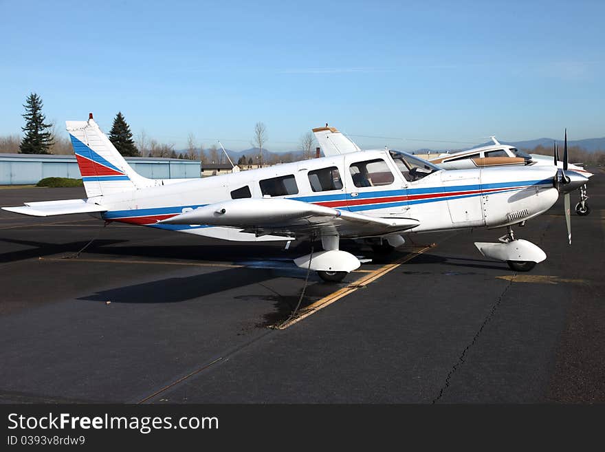 Single engine aircraft parked at the Troudale airport near Portland OR. Single engine aircraft parked at the Troudale airport near Portland OR.