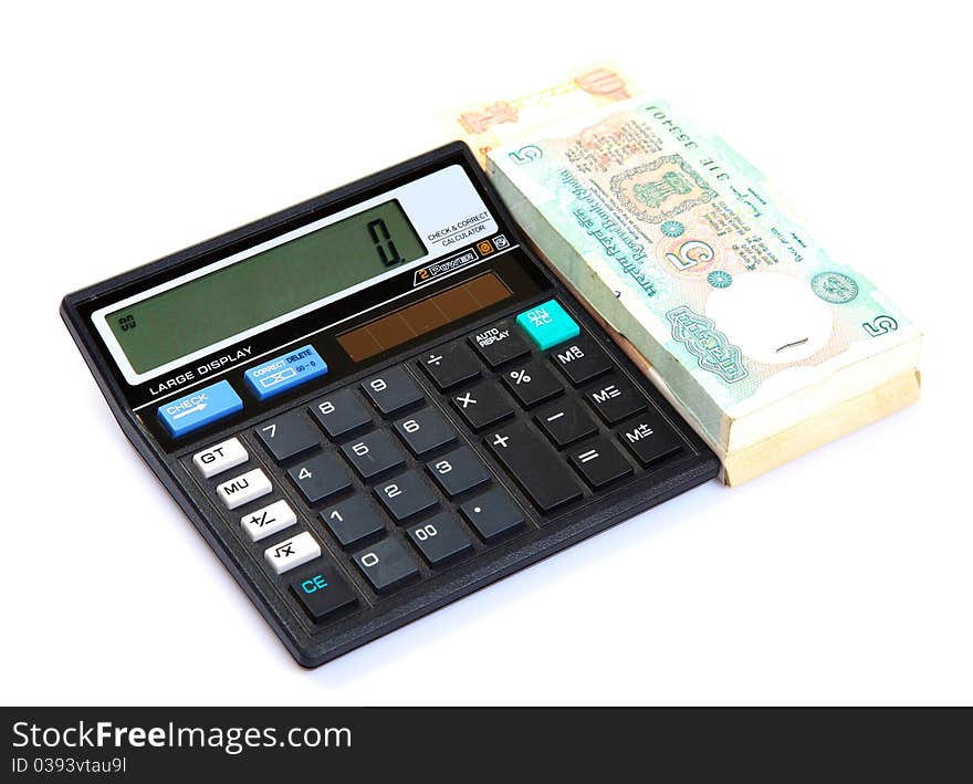 Currency notes with calculator over white isolated background. Currency notes with calculator over white isolated background.