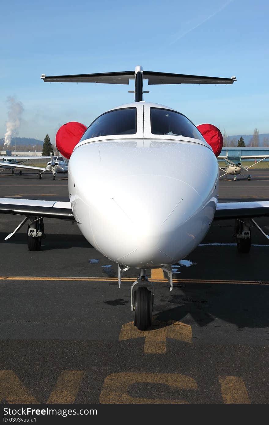 Private small jet parked at the Troudale airport near Portland OR. Private small jet parked at the Troudale airport near Portland OR.