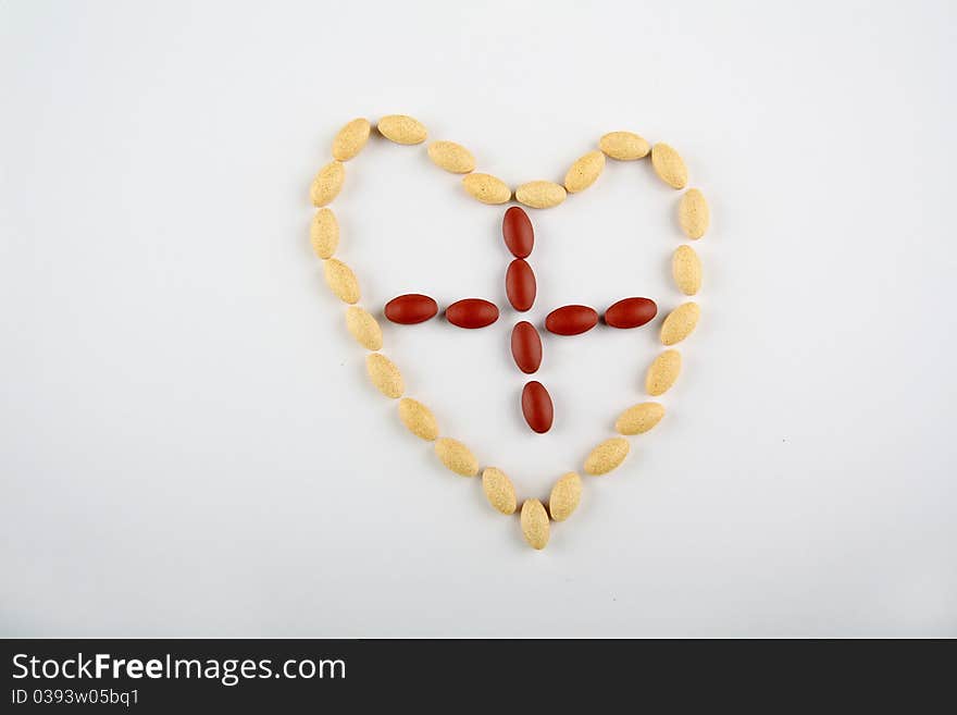 Pill heart with  cross