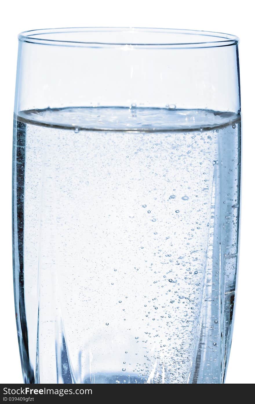 Glass of clear sparkling water. Glass of clear sparkling water