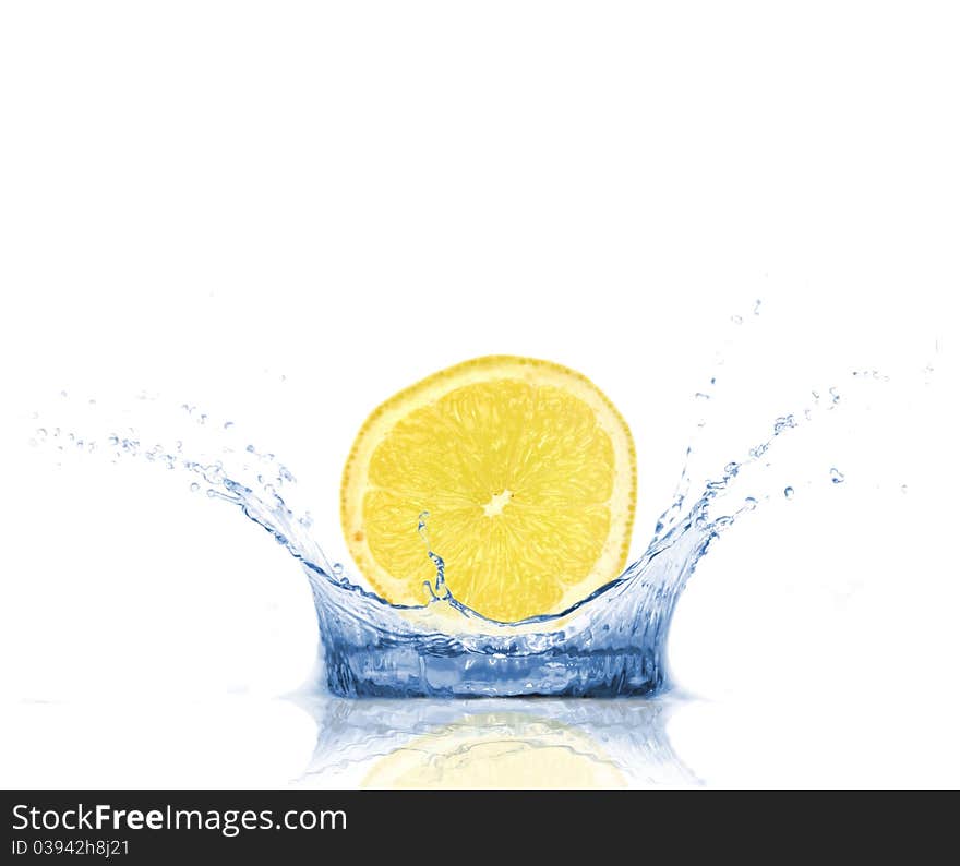 SLice of lemon falling into water, isolated on white background. SLice of lemon falling into water, isolated on white background