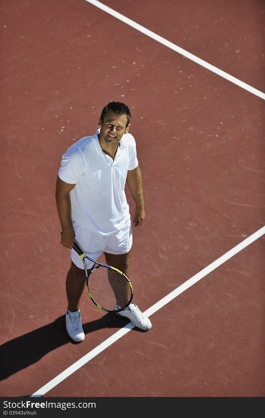 Young Man Play Tennis